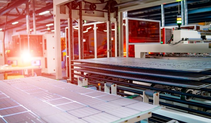 Solar panels being manufactured in factory