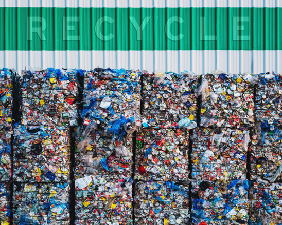 Large quantity of compacted plastic waste organized for recycling processes