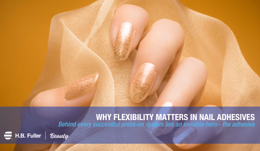 Soft cloth being held in hand and fingers with painted nails