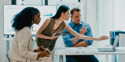 Team members discussing market insights