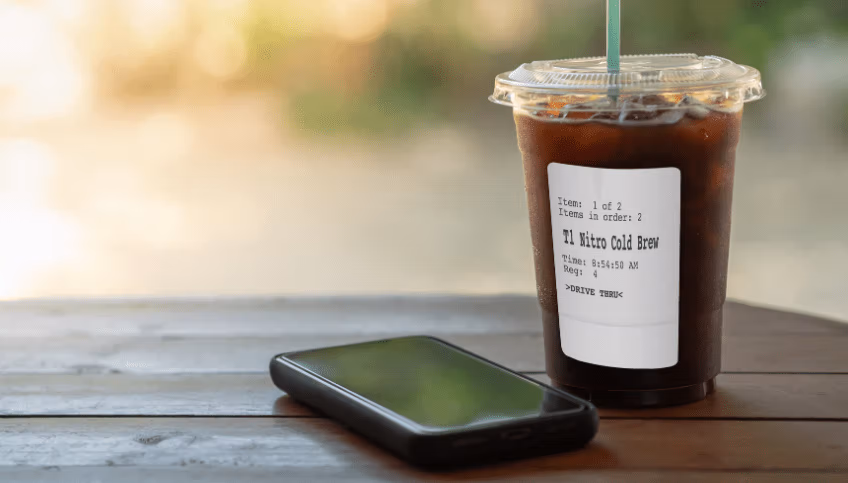 Cold beverage in a clear plastic cup