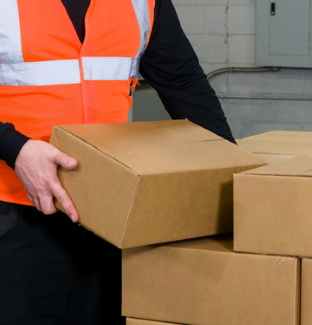 Person arranging carton boxes