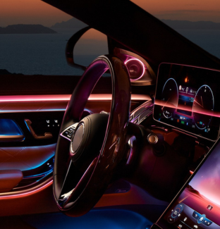 Car interior with infotainment system and ambient lighting
