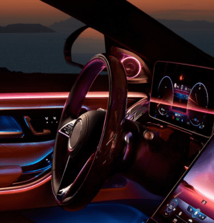 Car interior with infotainment system and ambient lighting