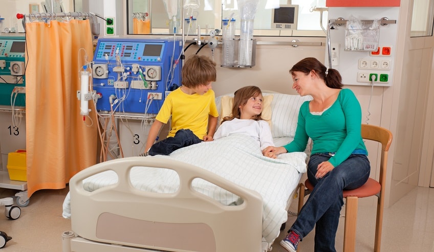 Hospital room with dialysis patient. 