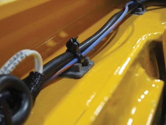 Adhesive application on crane cables