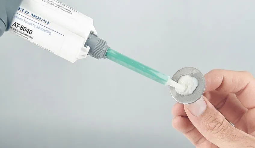 Weldmount adhesive application with glue gun