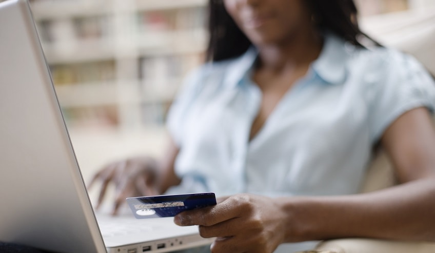 Woman shopping online with payment