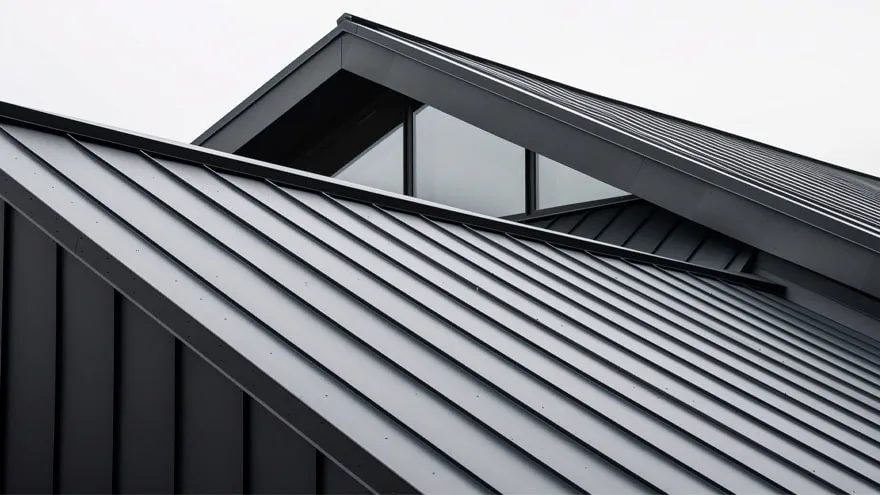 Grey metal roof with glass windows